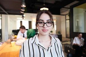 portrait of businesswoman with glasses photo