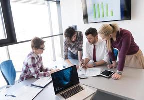 young business people group on meeting at modern office photo