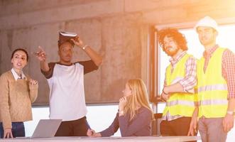 group of multiethnic business people on construction site photo