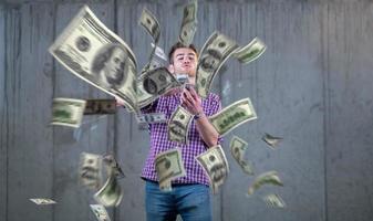 businessman making the rain of money photo