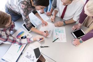 young business people group on meeting at modern office photo