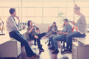 Young Business Team At A Meeting at modern office building photo