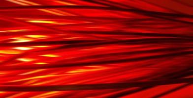 Banner with blurred defocused Halloween horizontal background. Bundle of hay or straw or brushwood or sticks backlighted by red lamp like a fire. Dark red and orange lines. photo