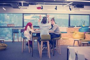 Young Multiethnic Business team using virtual reality headset photo