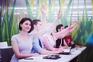 students group raise hands up photo