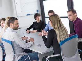 Business Team At A Meeting at modern office building photo