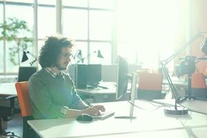 businessman working using a computer in startup office photo