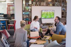 Startup Business Team At A Meeting at modern office building photo