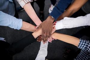 multiethnic Group of young business people celebrating success photo