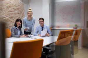 Business Team At A Meeting at modern office building photo