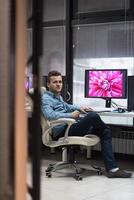 photo editor at his desk