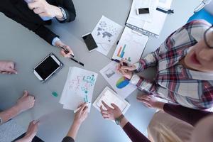 top  view of business people group brainstorming on meeting photo