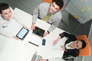 aerial view of business people group brainstorming on meeting photo