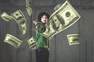 businessman making the rain of money photo