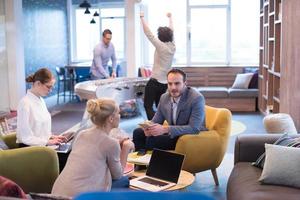 Startup Business Team At A Meeting at modern office building photo