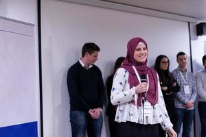 Muslim businesswoman giving presentations photo