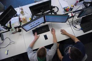 young programmers writing programming code top view photo