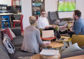 Startup Business Team At A Meeting at modern office building photo