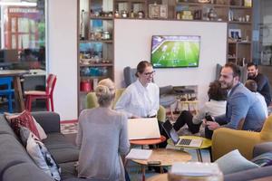 Startup Business Team At A Meeting at modern office building photo