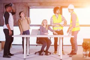 group of multiethnic business people on construction site photo