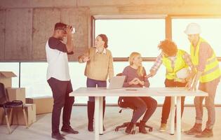 group of multiethnic business people on construction site photo