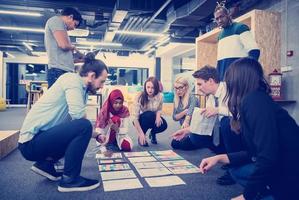 black muslim woman having meeting with Multiethnic  startup business team photo