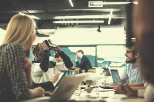 Young Multiethnic Business team using virtual reality headset photo