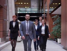 business people team walking photo