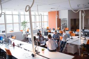 Young Business Team At A Meeting at modern office building photo