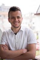 man standing at balcony photo