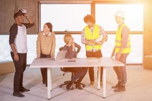 group of multiethnic business people on construction site photo