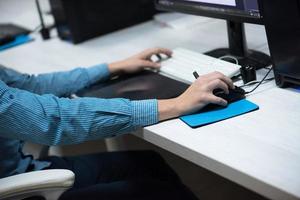 photo editor at his desk