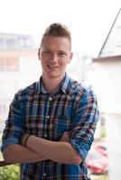 man standing at balcony photo