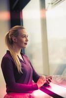 business woman using smart phone at office photo