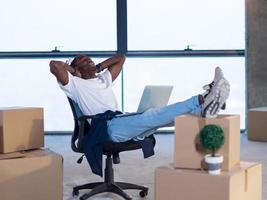 young black male architect taking a break on construction site photo