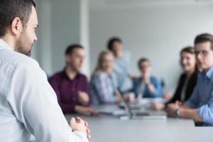 Business Team At A Meeting at modern office building photo