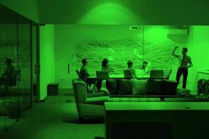 Group of young business people throwing documents photo