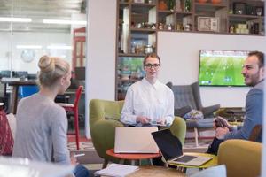 Startup Business Team At A Meeting at modern office building photo