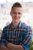 man standing at balcony photo