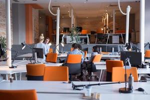 Young Business Team At A Meeting at modern office building photo