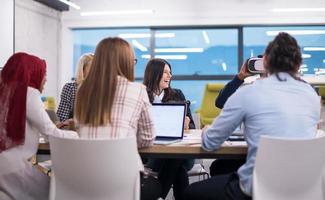 Young Multiethnic Business team using virtual reality headset photo