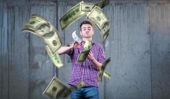 businessman making the rain of money photo