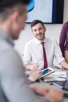 young business people group on meeting at modern office photo