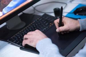 photo editor at his desk