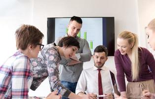 young business people group on meeting at modern office photo