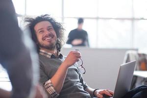 businessman working using a laptop in startup office photo