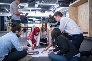 black muslim woman having meeting with Multiethnic  startup business team photo