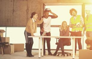 group of multiethnic business people on construction site photo