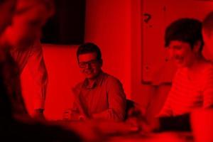 Group of young people meeting in startup office photo