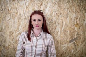 portrait of young redhead business woman photo